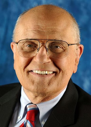 How long did Dingell's father hold the congressional seat before Dingell took over?