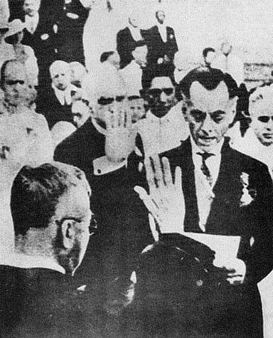 What major political event did WWII cause for Quezon's government?