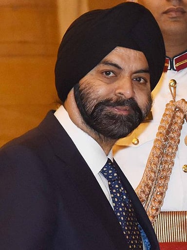 When did Ajay Banga retire from his position as executive chairman of Mastercard?
