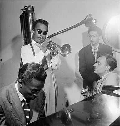 Which instrument was Miles Davis most famous for playing?