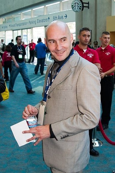 Grant Morrison has extensively worked for which American comic book publisher?