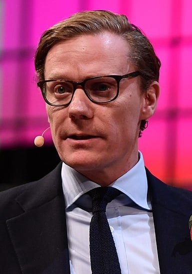 Which British political party does Cambridge Analytica have close ties to?