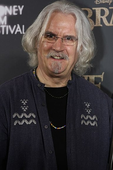 In which band did Billy Connolly perform folk rock music?