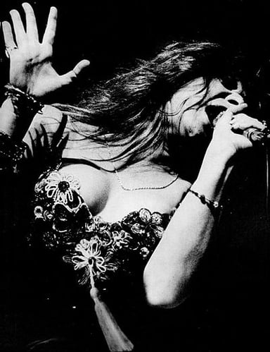 What was the name of Janis Joplin's first band?
