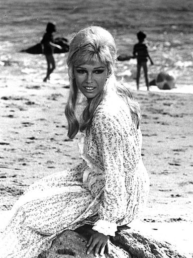 What is Nancy Sinatra's signature hit song?