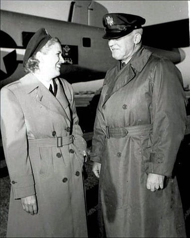 What year did Cochran become the first woman to land and take off from an aircraft carrier?