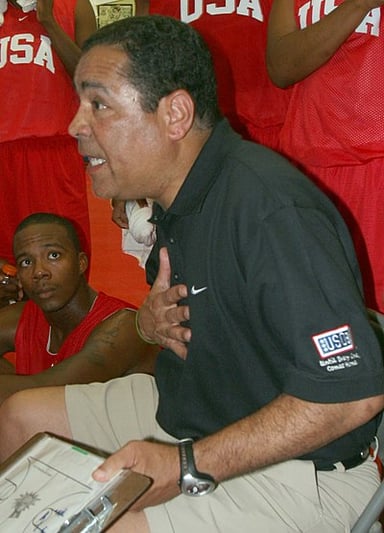 What university does Kelvin Sampson currently coach for?