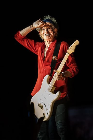 What is Keith Richards' role in the Rolling Stones, apart from being a guitarist?