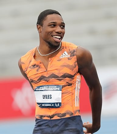 In which year did Lyles win the 100m/200m double in the Diamond League?