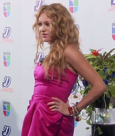 Which talent show did Paulina Rubio serve as a coach on in 2012?