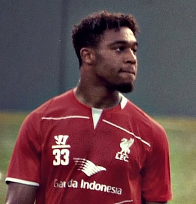 At what age did Ibe make his debut in professional football?