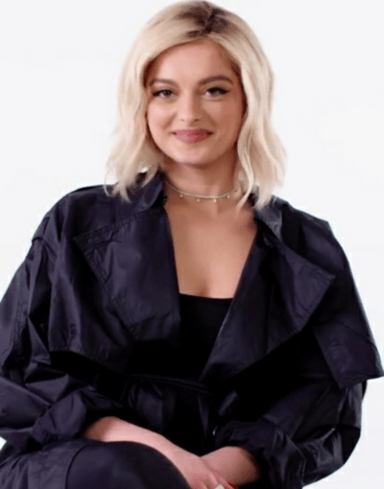 Which record label did Bebe Rexha sign with in 2013?