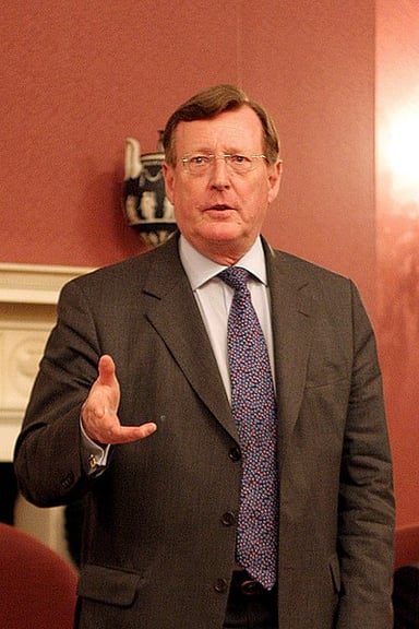 In which county is Lisnagarvey, the place after which David Trimble's title in the House of Lords is named?