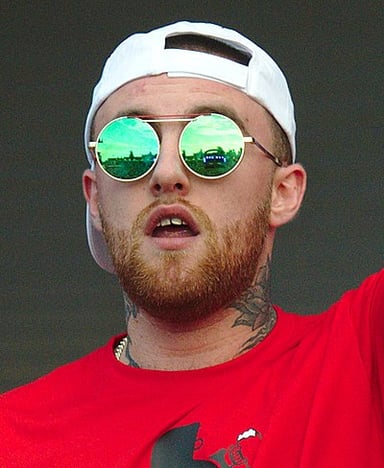 What was the name of Mac Miller's second album with Warner Bros.?