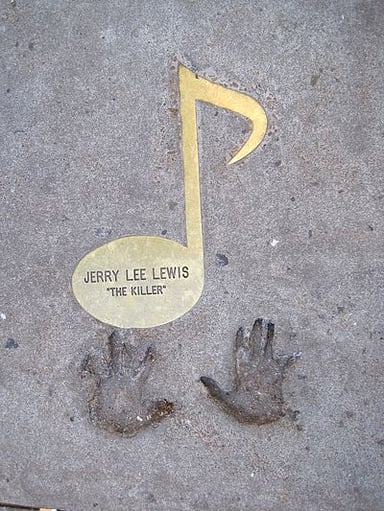In which year was Jerry Lee Lewis's best-selling album Last Man Standing released?
