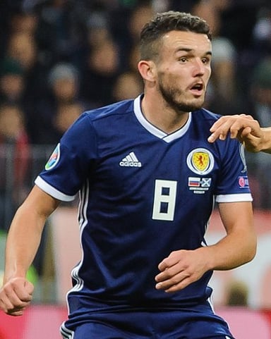 At which important football event did John McGinn represent Scotland in 2020?