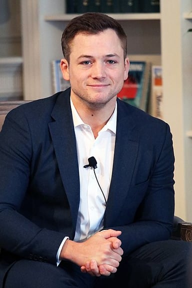 What was Taron’s role in the drama “Testament of Youth”?