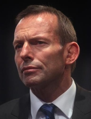 What is Tony Abbott's religion or worldview?