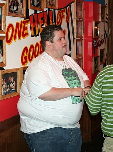 What was the title of Ralphie May's first comedy album?