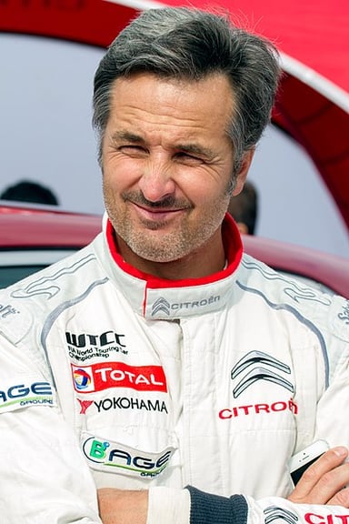 In which type of car racing Yvan Muller became a champion in 2003?