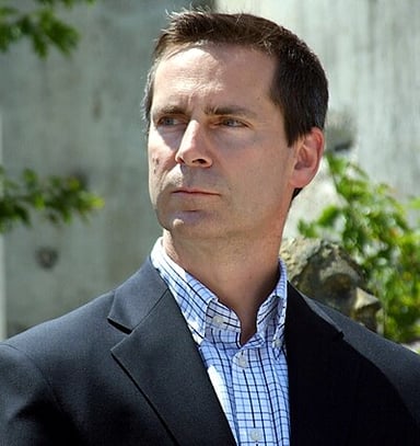 What year was Dalton McGuinty re-elected, securing a third consecutive term?