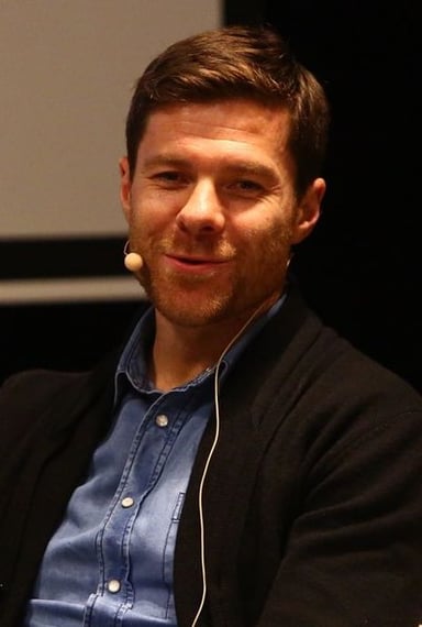 In which season did Xabi Alonso win the UEFA Champions League with Liverpool?