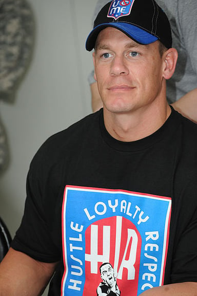 What sport team does John Cena play for or had played for?