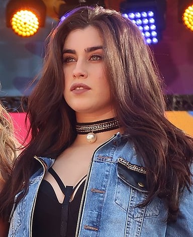 In which girl group did Lauren Jauregui rise to prominence?