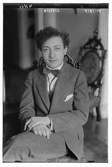 What style of violin playing did Heifetz master?