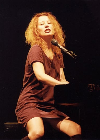Name a charting single by Tori Amos that has a food in its title?