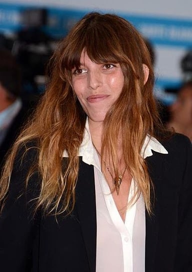 Apart from modeling, what other profession does Lou Doillon have? 