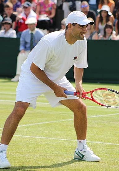 What specific type of tennis competitions did Andy Ram primarily play?