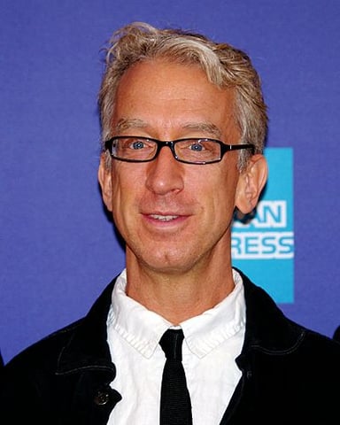 What was Andy Dick's first regular TV role?