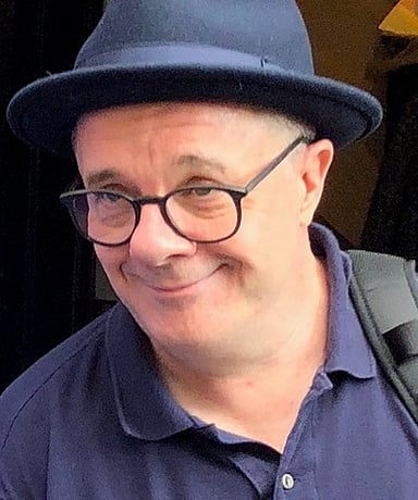 In which year did Nathan Lane star in Pictures from Home on Broadway?