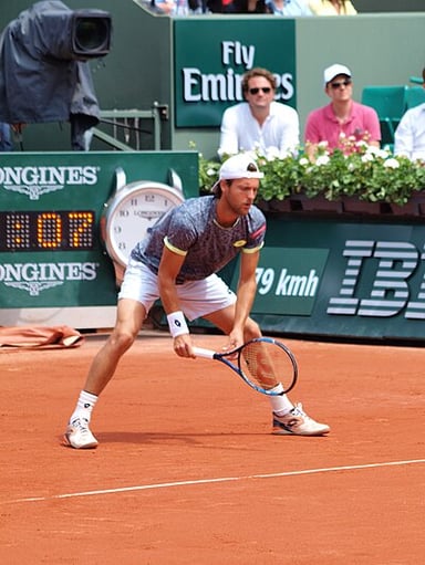Which Portuguese man holds the record for the most wins at Grand Slam singles tournaments?