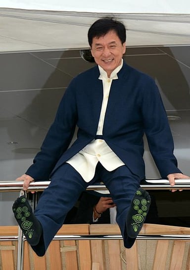 What is the religion or worldview of Jackie Chan?