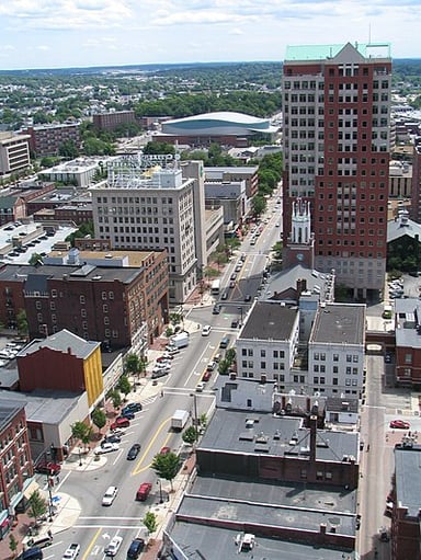 What is the primary reason for Manchester, New Hampshire's industrial development?