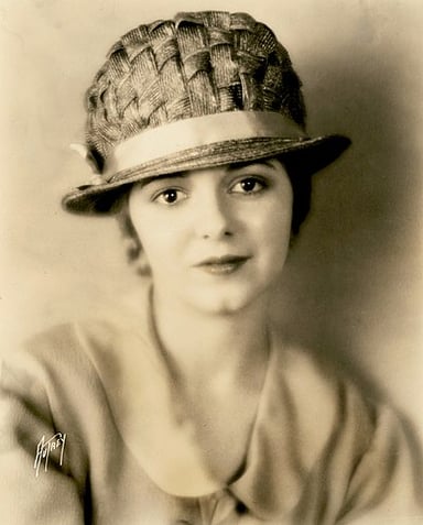 What was Janet Gaynor's first job in the film industry?