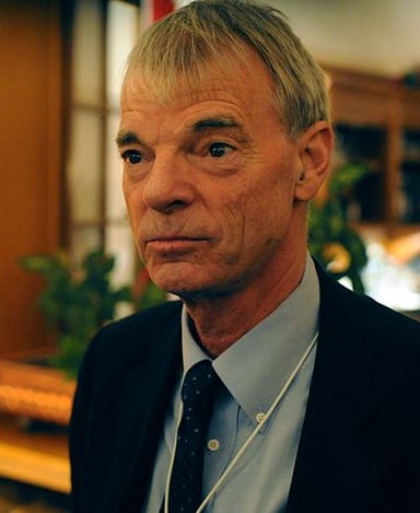What is Michael Spence's role at New York University?