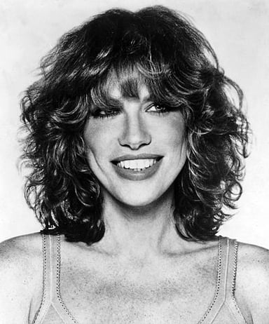 What award did Carly Simon win for the song "Let the River Run"?