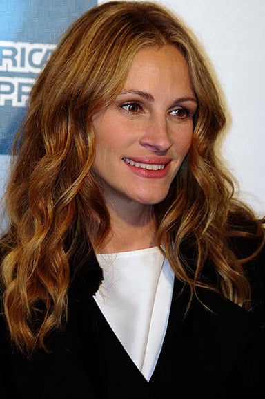 Which cosmetics brand has Julia Roberts been a global ambassador for since 2009?