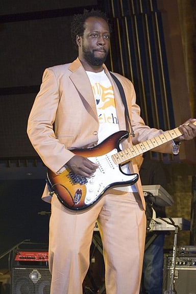 Which group was Wyclef Jean a founding member of?