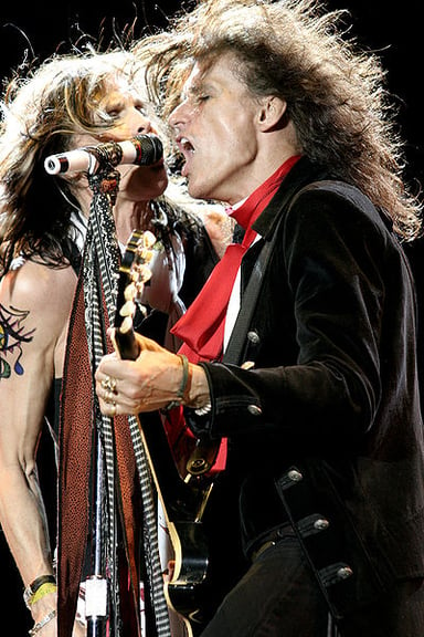 With which band did Aerosmith collaborate on a remake of "Walk This Way"?