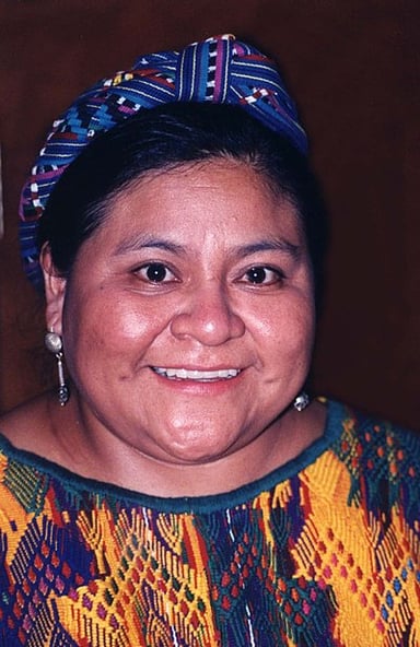 What is one of Menchú's main goals as an activist?