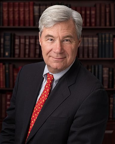 Sheldon Whitehouse's wife is also prominent in Rhode Island politics. What is her name?