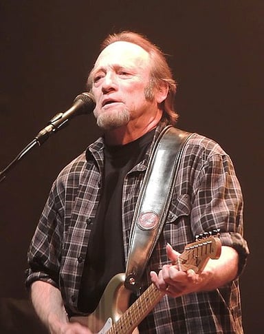 What instrument did Stephen Stills play in addition to guitar and keyboards for Crosby, Stills & Nash?