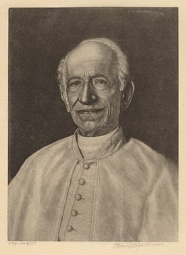 What theological system did Pope Leo XIII promote?