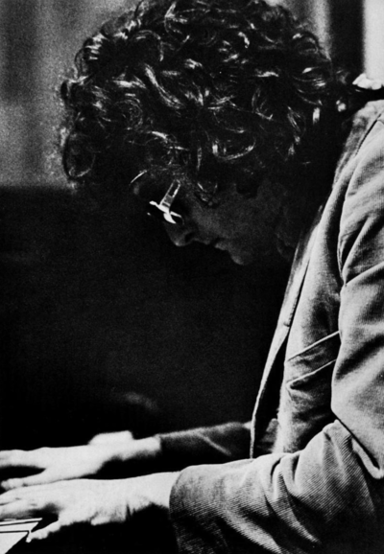 At what age did Randy Newman begin his songwriting career?