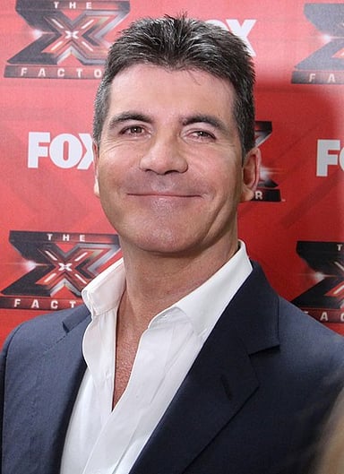 Which award did Simon Cowell receive in 2010?