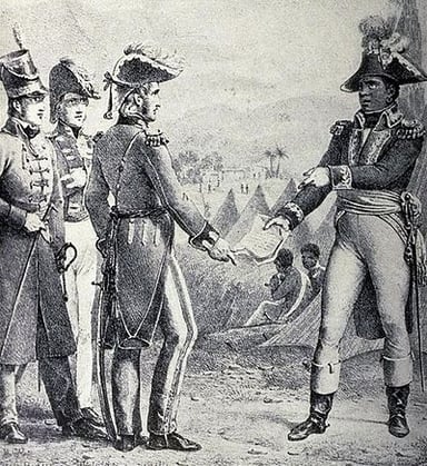 How did Louverture restore the plantation system?